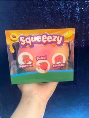Giant peach sweeezey squishy